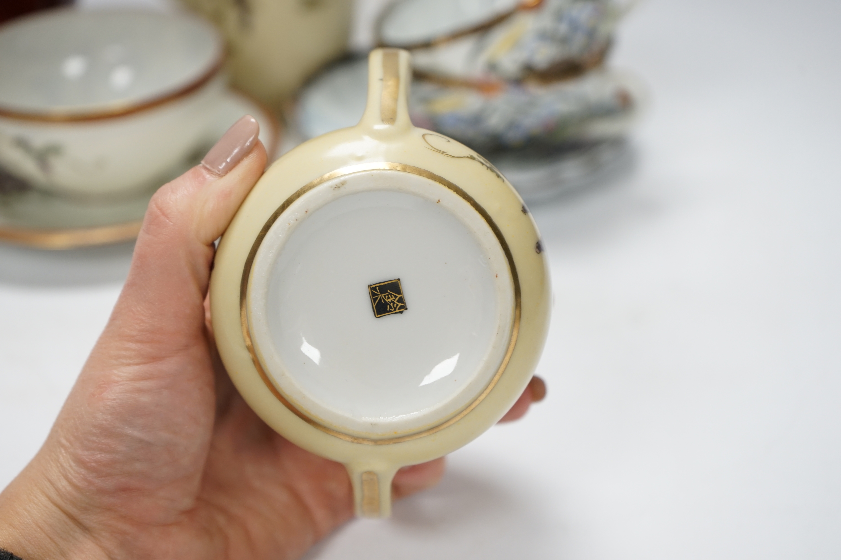 A Japanese cloisonné enamel vase, a pair of enamelled buttons and assorted Japanese ceramics including satsuma and kutani